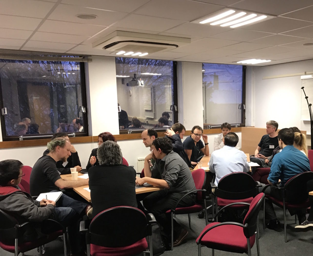 Crowd in conversation during workshop